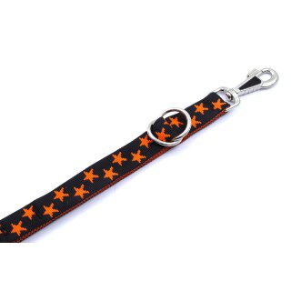Schwarz mit orangen Sternen
