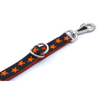 Schwarz mit orangen Sternen
